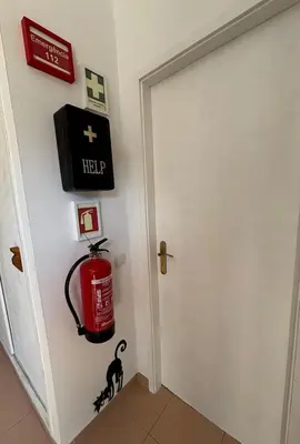a room with a door and a fire hydrant at no22FM in Vilamoura