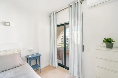 a dishwasher in a kitchen next to a sink at BnB Homes Apartments near Ocean & Lush Nature 500 m away from the ocean in Guia
