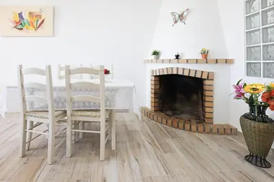 a white bathroom with a shower and a toilet at Vista Azul - 500 from the beach - AC - BY BEDZY in Albufeira
