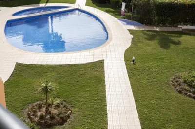 an overhead view of a swimming pool in a yard at Praia Village II - Peaceful condominium by HD in Vilamoura