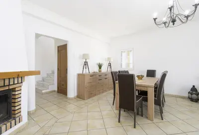 a living room with a couch and a table at Villa Menina by Ocvillas in Albufeira