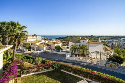 a view of the houses and gardens of a resort at Villa Sitambo- Pool & Sea View in Albufeira