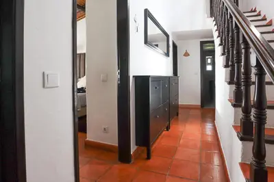 a hallway of a home with a staircase and aoyer at 2 Vale de Ursa - Swimming Pool - WIFI - BY BEDZY in Guia