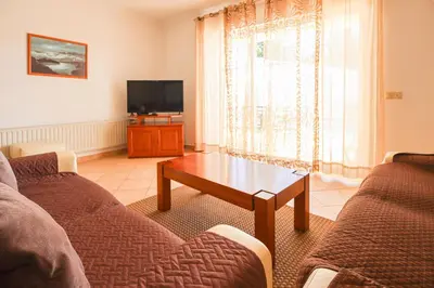 a living room with a couch and a coffee table at Villa Tio Pedro - Swimming Pool - For families- BY BEDZY in Albufeira