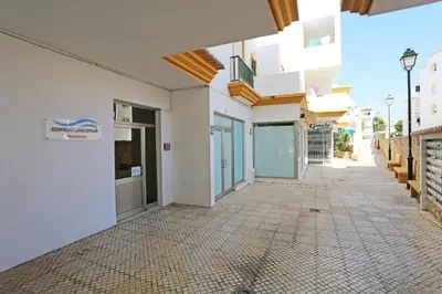 a corridor of a building with a walkway at A32 - Lancemar Flat in Albufeira in Albufeira