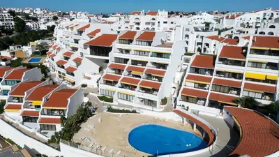 an aerial view of a large apartment complex with a swimming pool at Albufeira, Blue Wave Retreat 64 in Albufeira