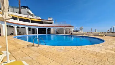 a large swimming pool on the side of a cruise ship at Albufeira, Blue Wave Retreat 64 in Albufeira