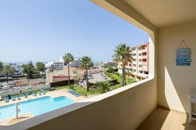 a view from the balcony of a hotel with a swimming pool at Dream place- Bela Vista in Albufeira