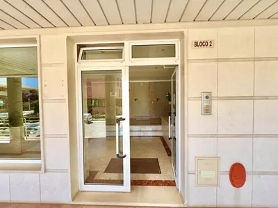 an entrance to a building with a glass door at Vilamoura Lovely Beach Stay With Pool by Homing in Vilamoura