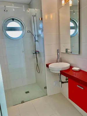 a bathroom with a shower and a sink at Vila orada lola in Albufeira