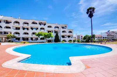 a large swimming pool in front of a building at Valmangude - Collection design par Enjoyyourstay in Albufeira