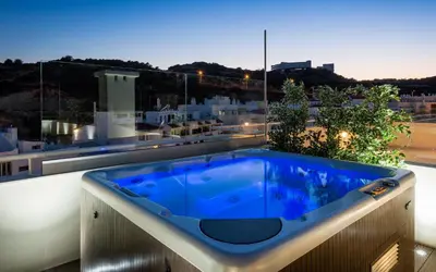 a blue tub sitting on top of a balcony at D_Loft Downtown in Albufeira