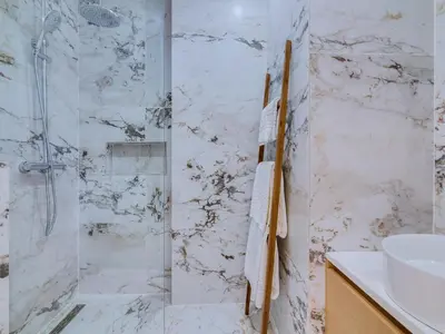 a bathroom with a shower and a sink at Art and Sea 2 bedroom apartment in Quarteira