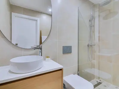 a bathroom with a sink and a shower at Art and Sea 2 bedroom apartment in Quarteira