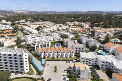 an aerial view of a city with white buildings at Fonte Moura - With pool by HD in Vilamoura