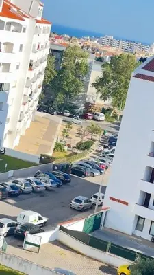 an aerial view of a parking lot with cars parked at Panoramic View in Albufeira