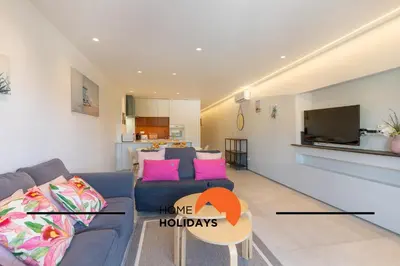 a bathroom with a toilet and a sink and a shower at #309 Marine Apartamento by Home Holidays in Albufeira