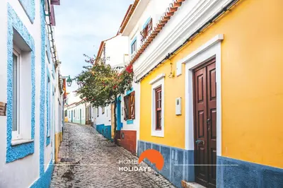 an alley in positano with colorful houses at #316 Flat New Town by Home Holidays in Albufeira