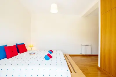 a room with a table with towels on it at Villa Marina by Algarve Vacation in Albufeira