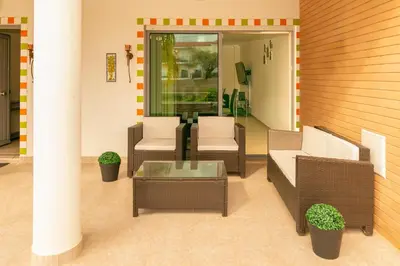 a patio with wicker chairs and a coffee table at Spacious Villa by Algarve Dream Holidays in Albufeira