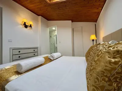a white bathroom with a sink and a toilet at Vilamoura Marina View 2 by Homing in Vilamoura