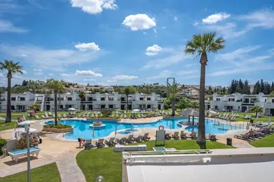 a view of the pool at a resort at Sunny Flat with a Balcony & Pool by HostWise in Albufeira
