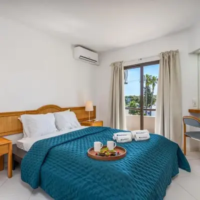 Sunny Flat with a Balcony & Pool by HostWise