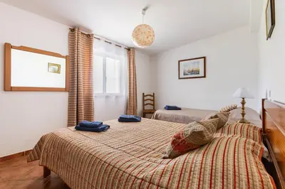 a bedroom with two beds in a room at Maison A Quinta V2B 7 Personnes in Ferreiras
