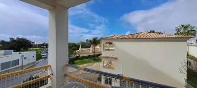 a balcony with a view of a building at Caranguejo Apartment in Albufeira