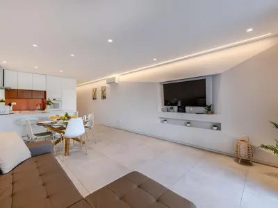 a living room with a couch and a table at Apartment Sol Salgado by Interhome in Albufeira