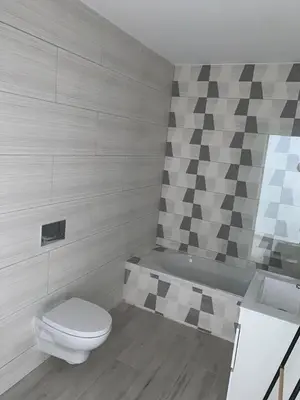 a bathroom with a toilet and a sink at Casa Foka in Faro