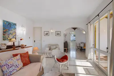 a living room with a couch and a table at Sail Golf Vilamoura V3 in Quarteira