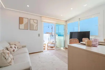 a kitchen counter with utensils and appliances on it at Sandora Pearl By Seareen, Penthouse with sea view in Albufeira