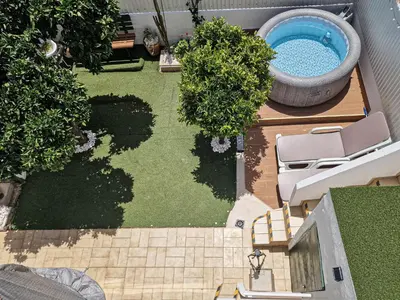 an aerial view of a backyard with a swimming pool at Casa Bacalhau - Tunes - Jacuzzi - BY BEDZY in Tunes