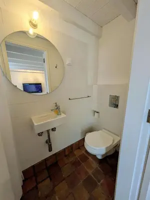a bedroom with a bed and a wooden ceiling at Laranjeira 1 by AlmaAlgarvia in Santa Bárbara de Nexe