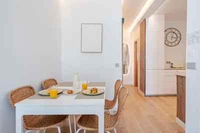 a bedroom with a bunk bed and a large window at Sandora Breeze by Seareen in Albufeira