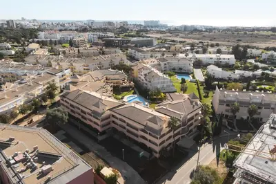 an aerial view of a city with buildings at Praia Village III - Peaceful condominium by HD in Quarteira
