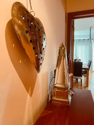 a trophy hanging on a wall next to a room at Marina Albufeira Best Apartment in Albufeira
