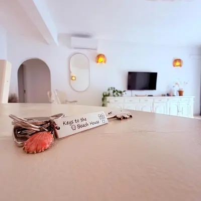 a pineapple on a counter with a sign on it at Casita 9 in Albufeira