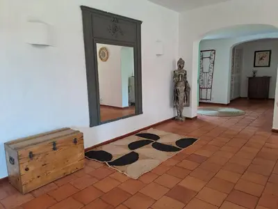 a dining room with a table and a pool at La Balaia - charm and comfort 12 people 9 beds in Albufeira