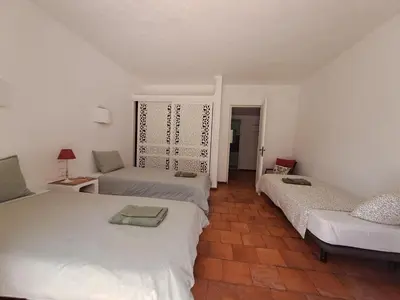 a bathroom with a sink and a mirror and a tub at La Balaia - charm and comfort 12 people 9 beds in Albufeira