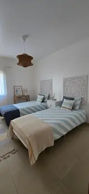 two large beds in a bedroom with at Quinta Do Vale 32 by AL in Guia