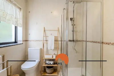 a bathroom with a shower and a toilet at #321 Lageado 1S by Home Holidays in Vale de Pedras