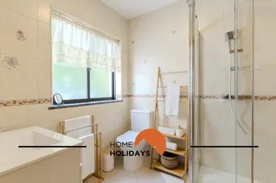 a bathroom with a shower and a toilet and a sink at #321 Lageado 1S by Home Holidays in Vale de Pedras
