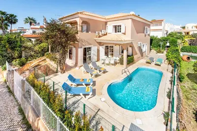 an aerial view of a house with a swimming pool at Villa Casanova Golf in Quarteira