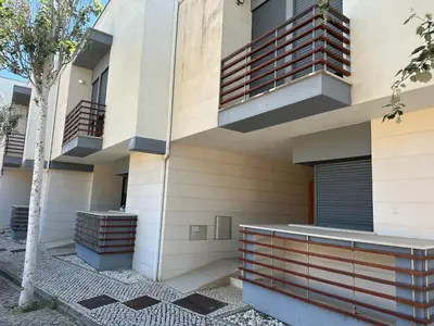 an exterior view of a building with balconies at Monte da Vinha By FHR in Quarteira