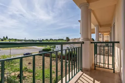 a balcony with a view of a street at Bright 3-BR in Guia with Shared Pool by Lisbeyond in Guia