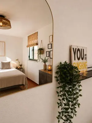 a bathroom with a shower with a window at Refúgio No16 Ocean Air & Rooftop Flair in Albufeira