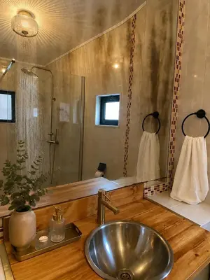 a bedroom with a large bed with at Refúgio No16 Ocean Air & Rooftop Flair in Albufeira