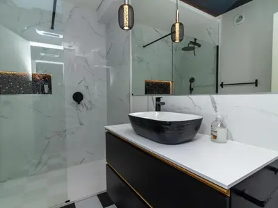 a bathroom with a bowl sink on a counter at Oásis Apartment by Stay ici Algarve Holiday Rental in Albufeira